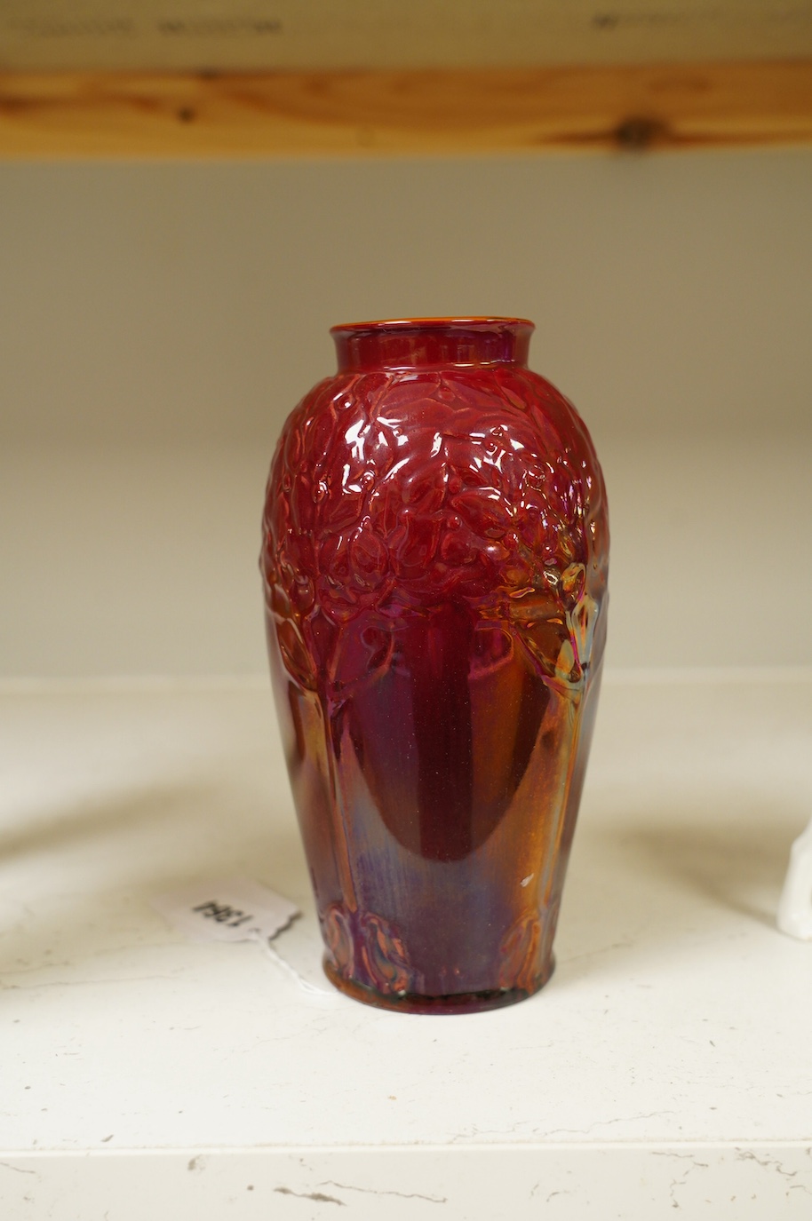 A Pilkingtons flambé lustre ‘fruit tree’ moulded vase, impressed, 18.5cm high. Condition - good